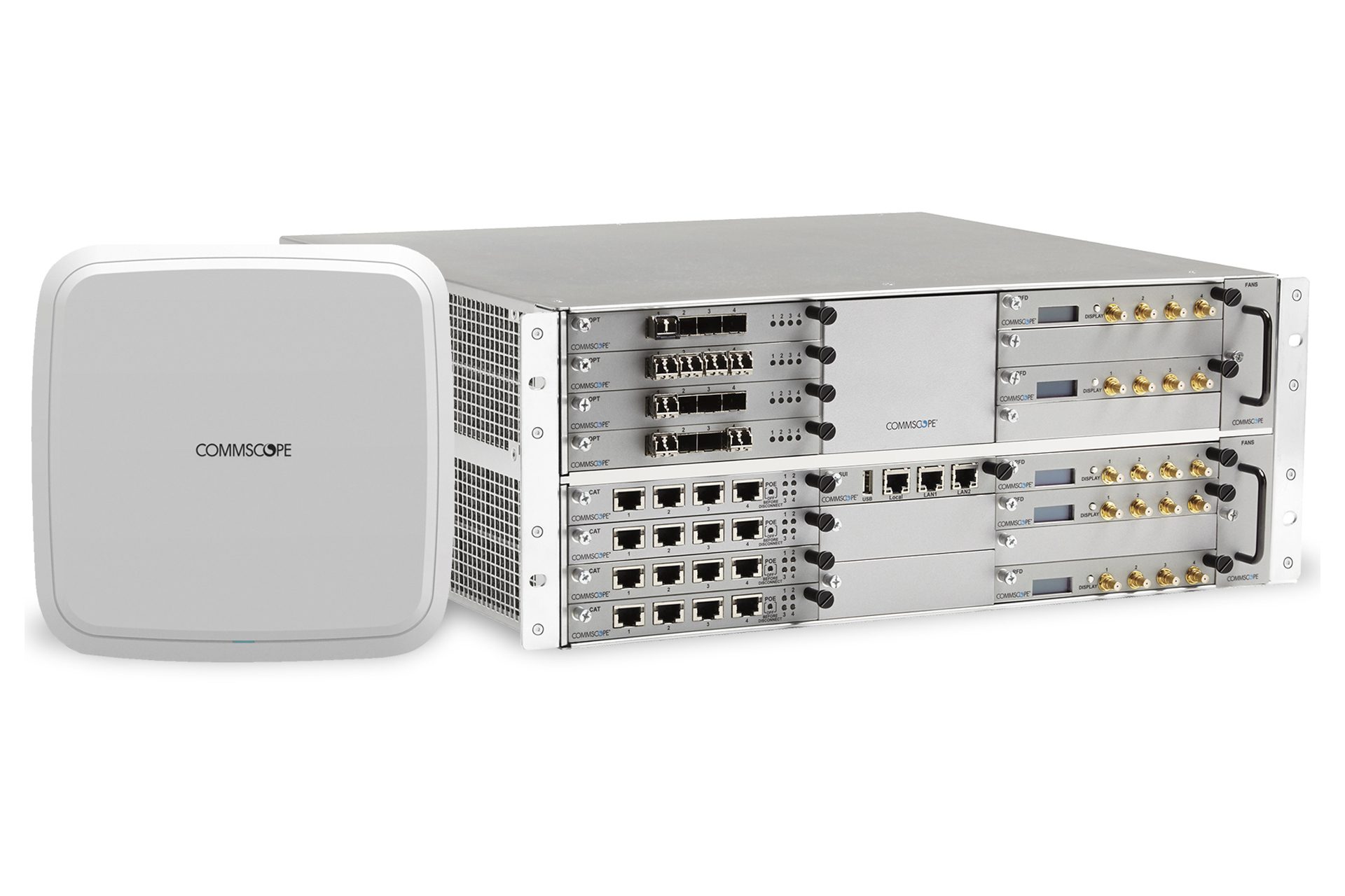 A commscope ION-E system head-end is shown with an antenna (UAP).  System may reside anywhere and is connected over network, coaxial or fiber to various locations in the property to extend coverage.