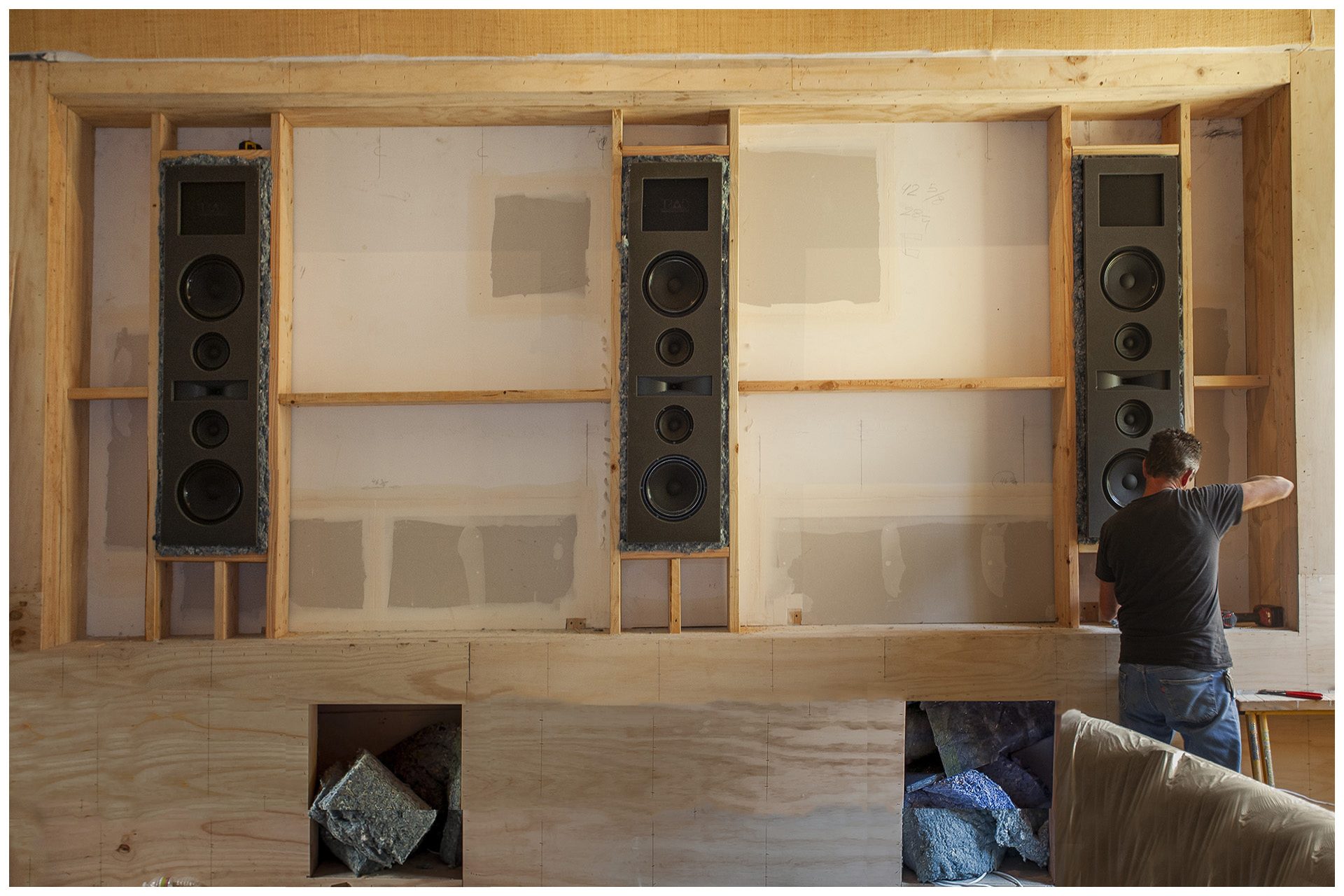 DEDICATED LARGE THEATER Front speakers were secured in between framing we created, speakers are attached to framing with isolation materials and fasteners in order to prevent vibration transfer to framing.